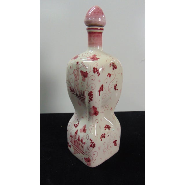 Italian Terra Cotta decanter, white base color with pink scenic and floral designs