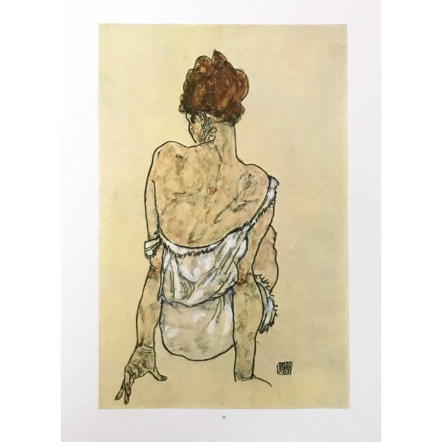 Artist: Egon Schiele Country: Austria Title: Seated woman back view Medium: Offset – 33 Paper: Heavy paper 16 x 12 inch...