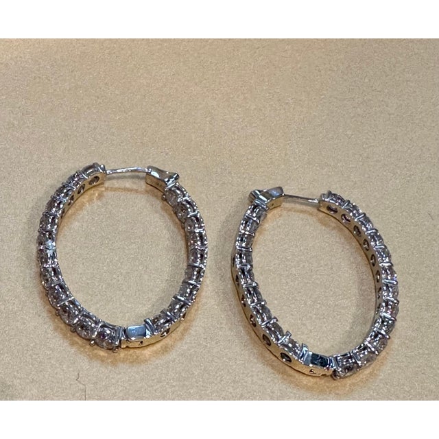 10.5 Carat 21 Pieces in each hoop Diamond Inside Out Hoop Gala Cocktail Earrings in 14 Karat White Gold A fabulous pair of...