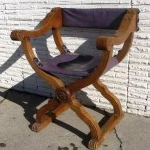 CH 687 Savonarola walnut arm chair of double X shape, carved acanthus leaf and center carved rosette. Rectagular leather...