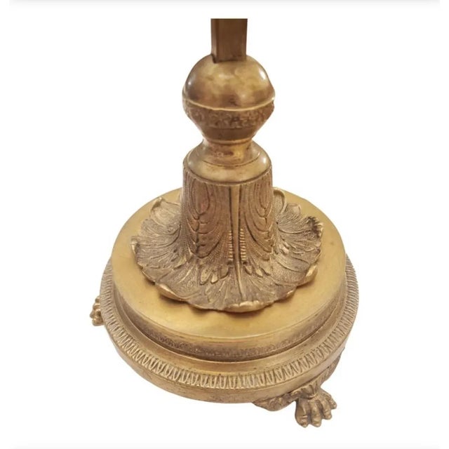 Louis XVI antique bronze base with three lights French Bouillotte table lamp. Great looking red Tole shade with hand...