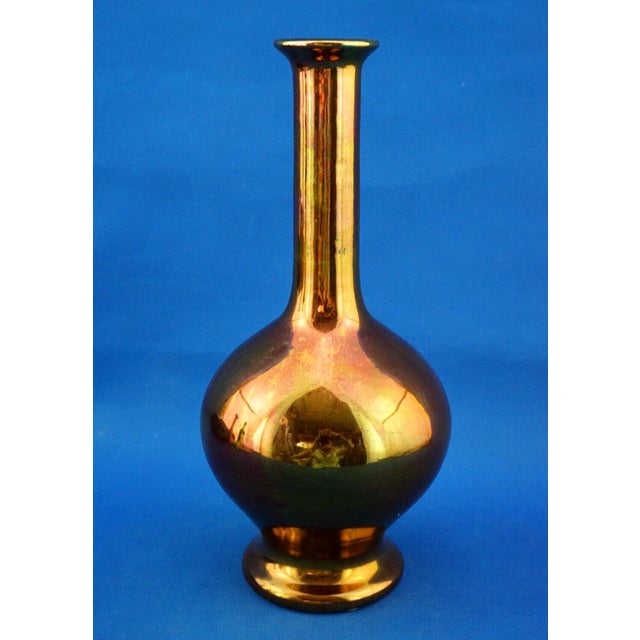Item : a magnificent ceramic bottle vase, entirely handcrafted on a wheel, glazed with dark red florentine gold metallic...