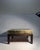 A Campaign Style Brass Coffee / Side Table by Sarreid Plenty of wear and Patina to the brass as shown. These usually clean...