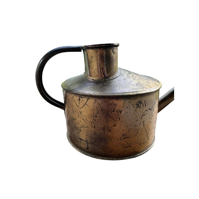 Experience the "Modern Heirloom" charm of a Genuine Haws Elliott Brass Watering Can. This exquisite piece of English...