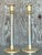 Elevate your decor with this stunning pair of vintage Maitland Smith brass and chrome candlesticks, embodying a bold blend...