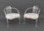 Pair of Charles Hollis Jones Style Lucite Arm Chairs, each seat upholstered in white faux fur. 26.5" H x 23.5" W x 21" D;...