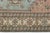 Elevate your home decor with this beautiful, handwoven vintage Turkish area rug. Featuring a delicate harmony of soft pink...