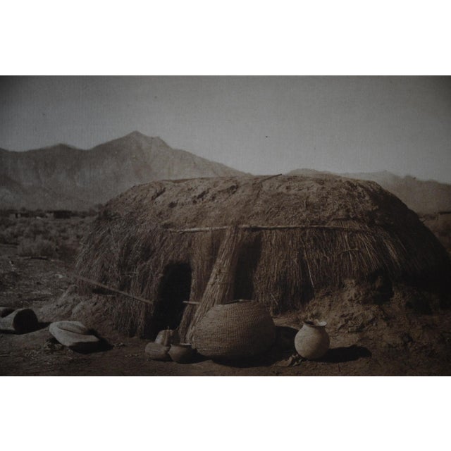 One of the signature plates of the early volumes of The North American Indian, this photogravure depicts a traditional...