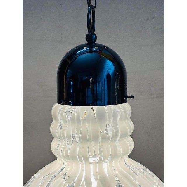 Murano hanging lamp Glass design reminiscent of snowflakes Year – 1970s Dimensions: 33 cm – diameter 53 cm – height 93 cm...