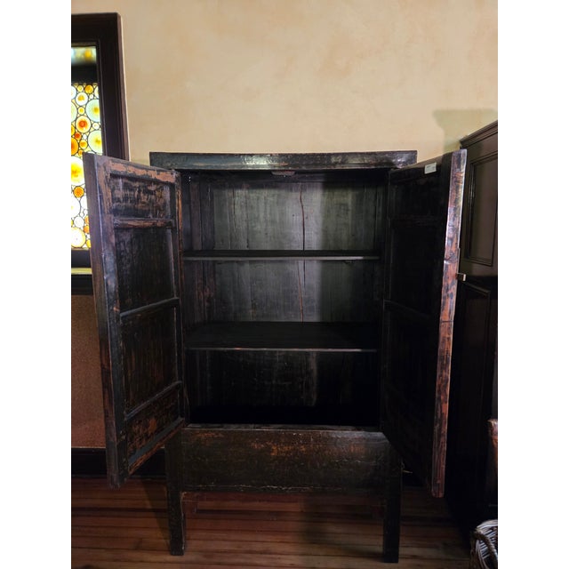 Beautiful antique Chinese chest with traditional metal door bolt.