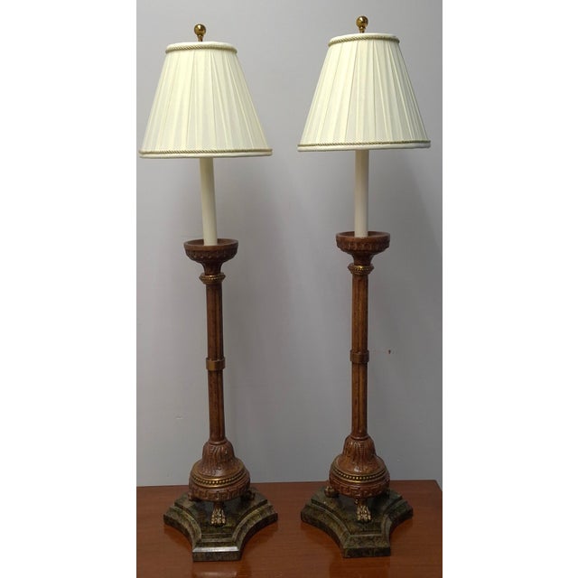 A Pair of Maitland-Smith Candlestick-Form Table Lamps with original shades harp and finials.. Measures 9" in with, 8" in...