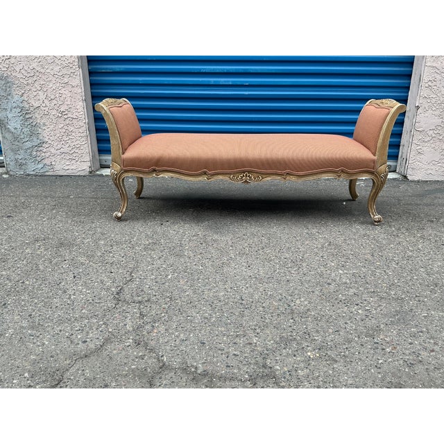 H-24 W-60 D-14. Country French settee/ bench. Antique bench is solid. Has stains on sides. Frames has distressed finish....