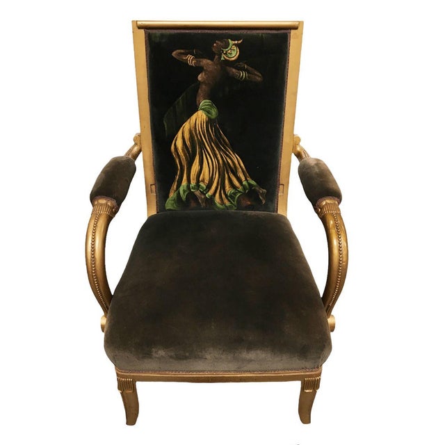 Vintage velvet upholstered gorgeous armchair with a painted dancer on the back. This gorgeous armchair features a painted...