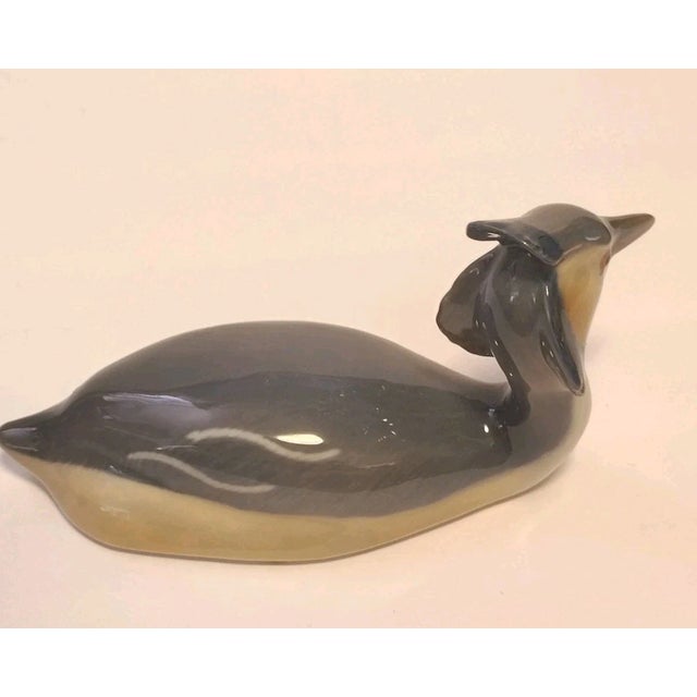 Add a touch of timeless Scandinavian elegance to your collection with this **Vintage Mid-Century Modern Royal Copenhagen...