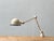 Iconic industrial articulated lamp from france, designed by jean-louis domecq and manufactured by jieldé. This model...