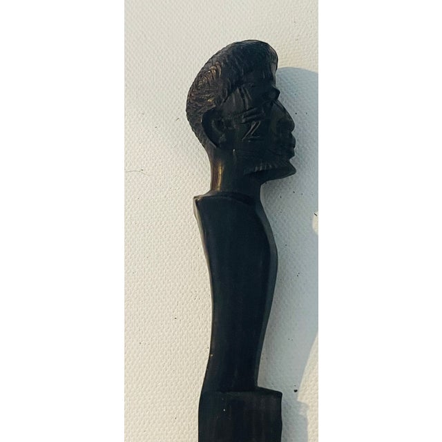 Vintage handcarved ebony head as letter opener or book marker.
