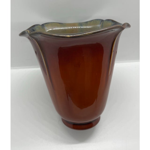 This RARE Stunning 1932 Rookwood Squeeze Bag Vase, model #6314, has a Coromandel Glaze beautifully offset with gunmetal...