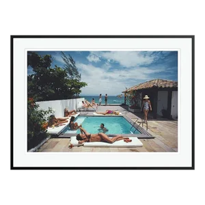 Buzios 1983 by Slim Aarons Framed C-Print