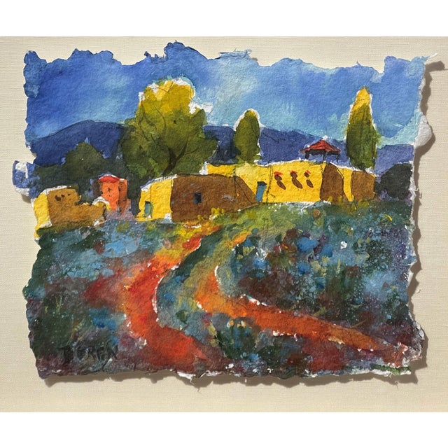 Taos Morada by Evelyne Boren | Watercolor of a colorful adobe building landscape For Sale