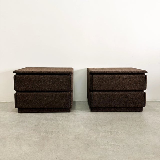 A rare pair of vintage mid-century nightstands, beautifully re-veneered in chocolate cork. Clean drawers, sturdy...