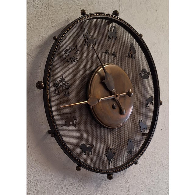 Mid-Century German Zodiac Sign Wall Clock by Mauthe, 1950s, in Very Good conditions. Designed 1950 to 1959 This piece has...