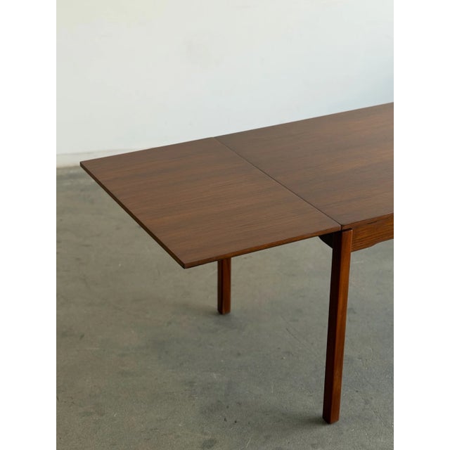 W86.75-47.25 D31.5 H29 KC24.5 This classic danish mid century modern table has been fully restored. Slightly curved edges...