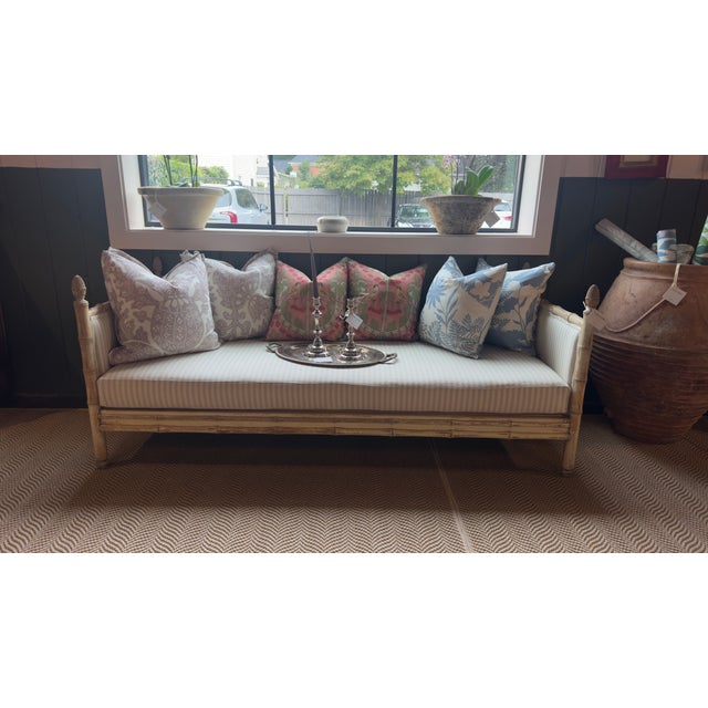 French Faux Bamboo Daybed, 20th Century An elegant French daybed featuring a painted faux bamboo frame, carved finials,...