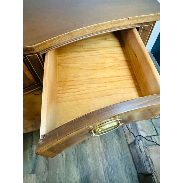 Elevate your dining space with this stunning Federal style bowfront sideboard. Crafted from rich mahogany with elegant...