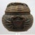 A finely carved Japanese wooden okimono in the form of a basket, topped and flanked by three large expressive crabs...