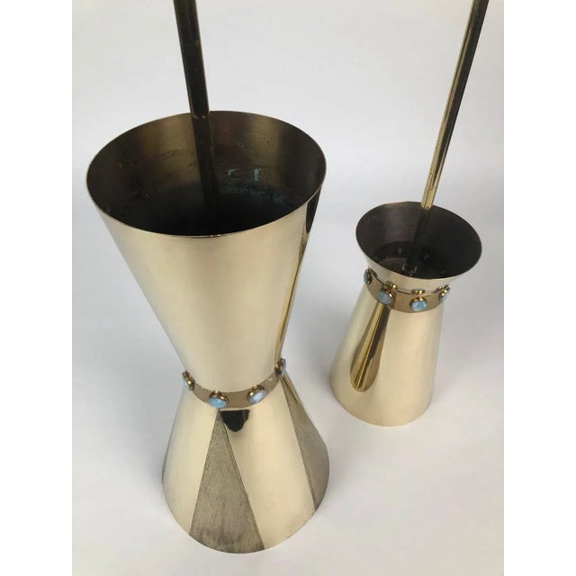 Two lamps made in brass with Murano glass cabochons in blue. The lamps are unique: designed by the architect Carl Appel...