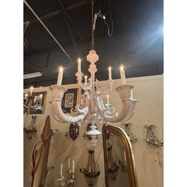 This 19th c. French Carved Whitewashed Chandelier is a stunning and elegant lighting fixture. Features beautiful intricate...
