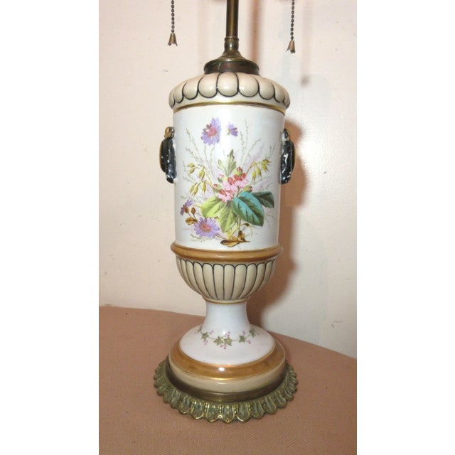 Up for sale is a rare antique 19th century pottery and brass electrified oil lamp. The pottery base has a removable ribbed...
