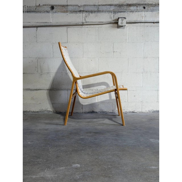 Vintage Swedish bentwood lounge chair designed in the manner of Finn Østergaard, dating to the 1970s. Features a...