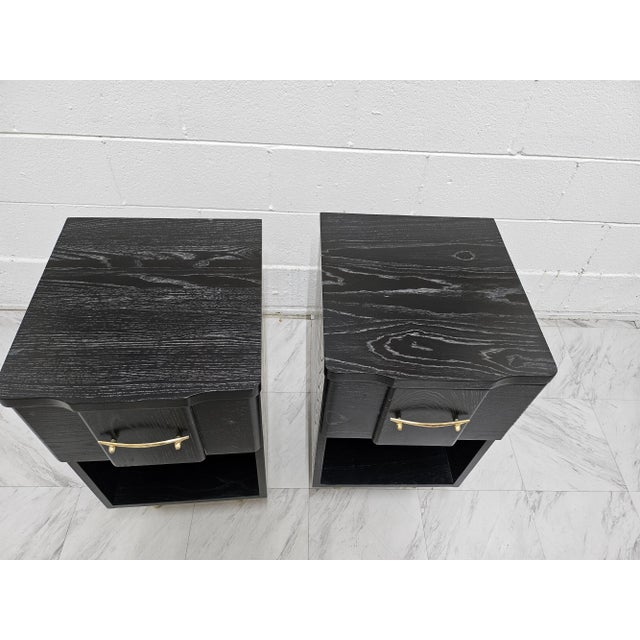 Pair of night stands made out of solid ash wood, just refinished in a black cerrused finish that shows the wood grain...
