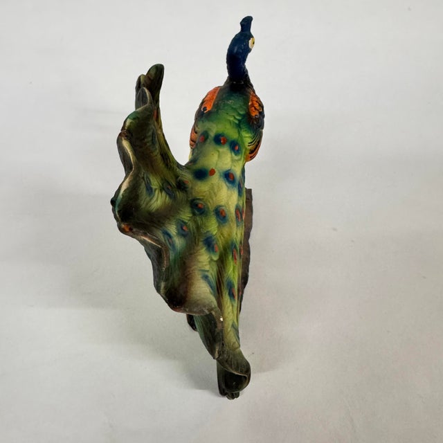 Porcelain Artmark peacock figurine that is in decent condition. Just two very tiny chips on the Tail and another on the...