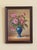 A richly composed late 20th‑century still life, this oil on board features a classical arrangement of flowers gathered in...