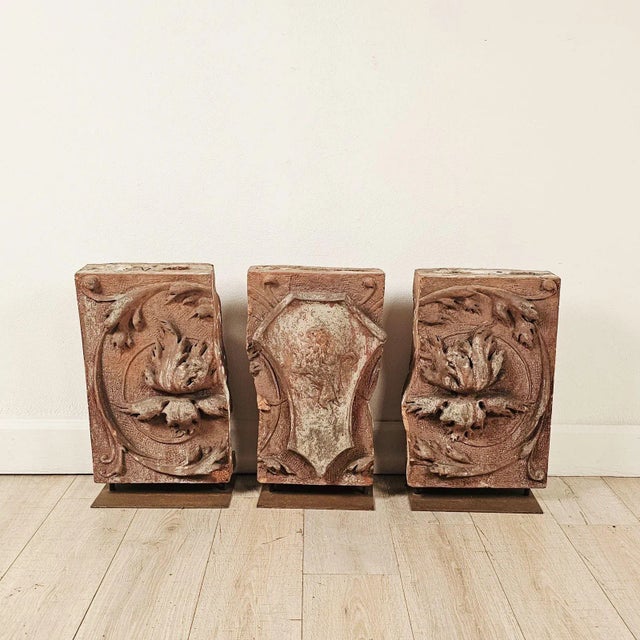 A set of three terracotta tiles, U.S.A. circa 1920. The listed measurements are overall measurements for the three tiles...