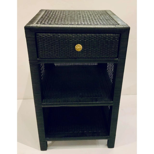Original Retail $1570, stylish Made Goods Modern Onyx Finished Rattan Isla Nightstand, one drawer with brass pull, one...
