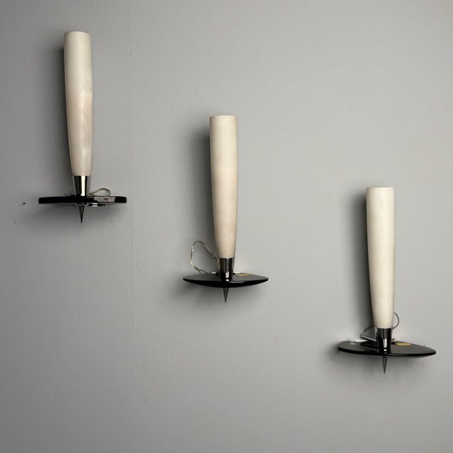 Fontana Arte Attr., Italian Mid-Century Modern, Wall Sconces or Wall Lights, Chrome, Glass This elegant pair of wall...