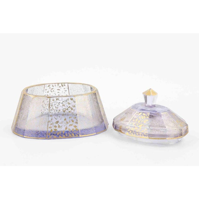An elegant and rare Art Nouveau Glass Dresser Box by Moser, Austria. Realized in the early years of 1900, with gold...