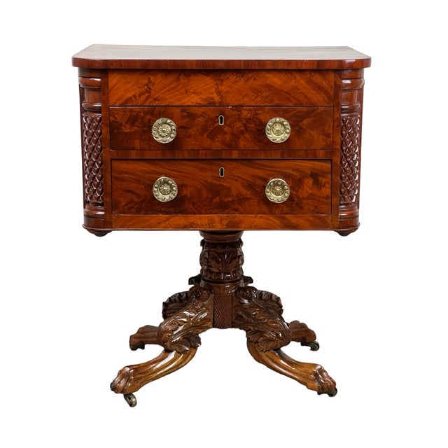 This Antique Federal Period Mahogany Work Table, dating to around 1840, is a striking example of American craftsmanship...