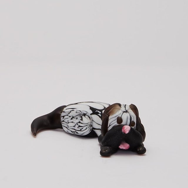 Animal sculptures by Archimede Seguso (1909-1999) Italy made circa 1970 a dog and rabbit in solid opaque glass, foil label...