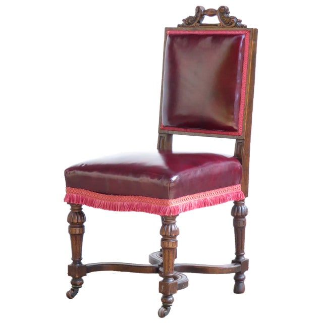 We are having an internal debate on the style and country of origin of this wonderful chair. Some point out the carved...