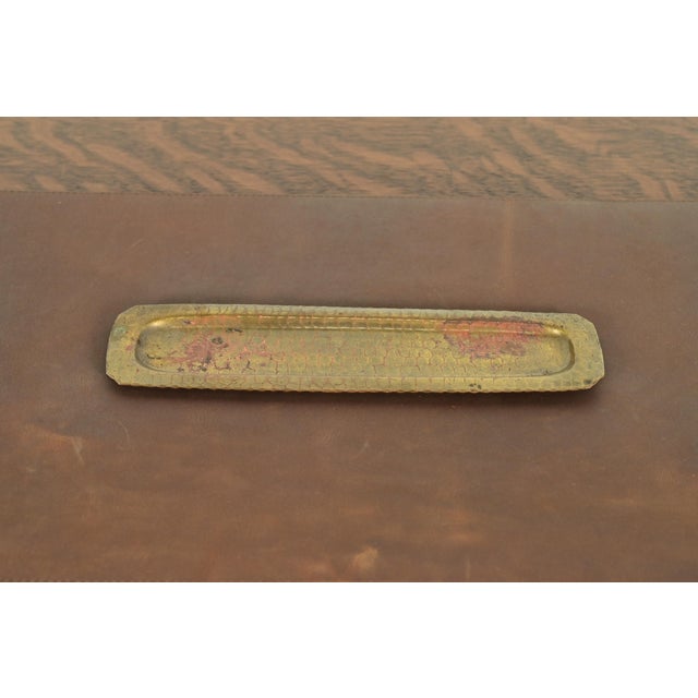 A gorgeous Arts & Crafts period brass finished hand hammered copper pen tray By Roycroft (signed with impressed orb and...