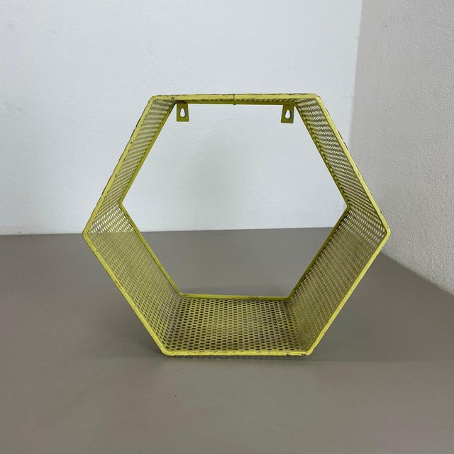 Article: wall unit element with hole pattern Designer and Producer: Mathieu Mategot attributed. Origin: France Material:...