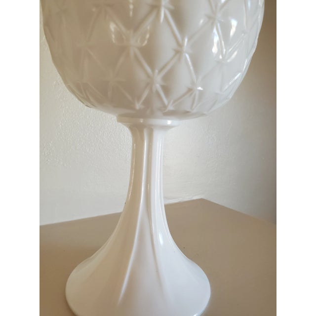 Sweet 1950s milk glass goblet vase with fluted edges and quilited design. Absolutely stunning piece for any collector....