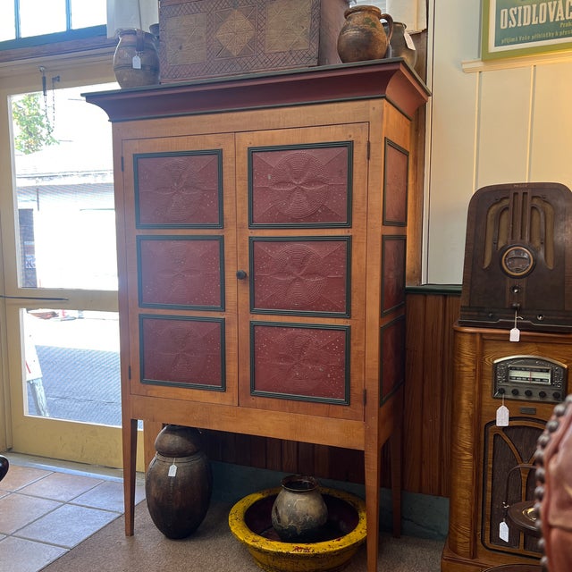 Early American style pie safe with punched tins in the doors and sides made of tiger maple and poplar Standing on...