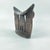 Ethiopian headrests come in various forms. They range from simple to elaborately carved artifacts. They have abstract...