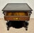 Elegant Portuguese side table featuring a single drawer, decorative carved details, and a shaped lower shelf. The table...