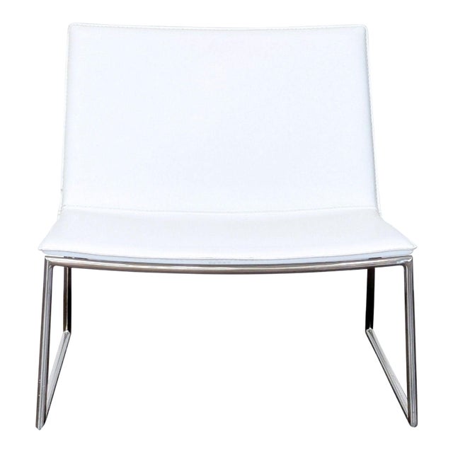 Cb2 Triumph Modern White Leather Lounge Chair With Sleek Chrome Frame For Sale